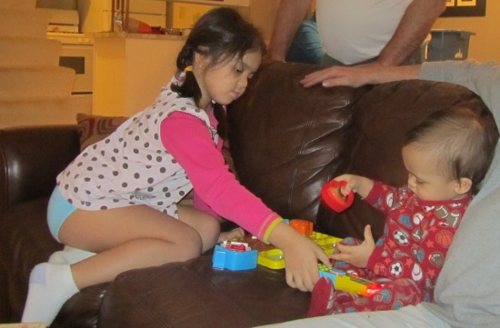 Yaya and Adik playing with the new toys!