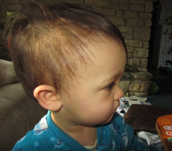Adik has enough hair for bed-head!