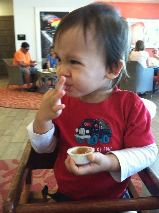 Adik loved to feed himself peanut butter from the single-serving peanut butter container