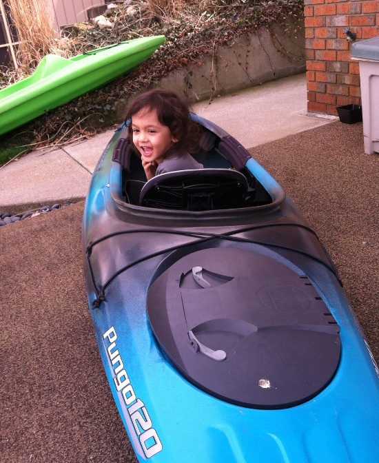 Laughing in a kayak