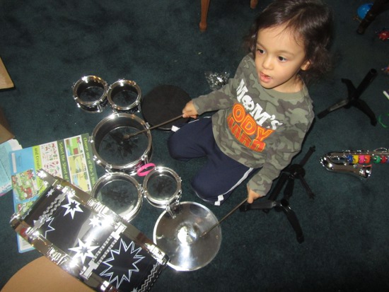 Giving the new drum set a try