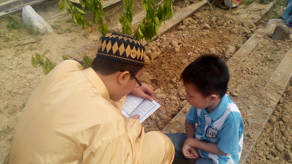 Aiman listens to Irfan's reading