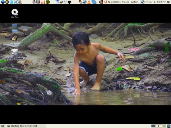 Irfan at the desktop playing with mud