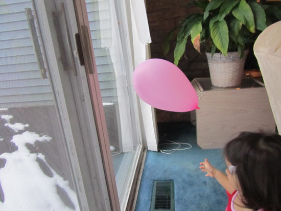 Pink balloon floating