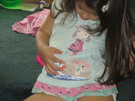 This shirt that Auntie Jo gave Yaya has an "attached tutu"!!