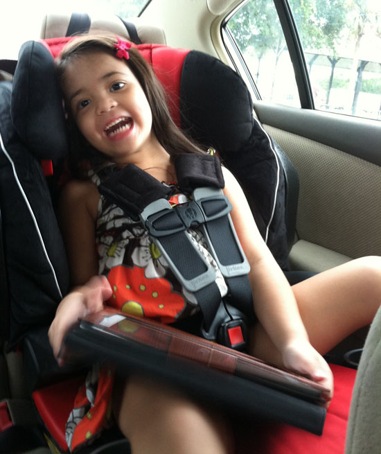 Happy girl in her new booster seat!
