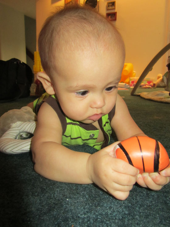 Squeezing the little basketball