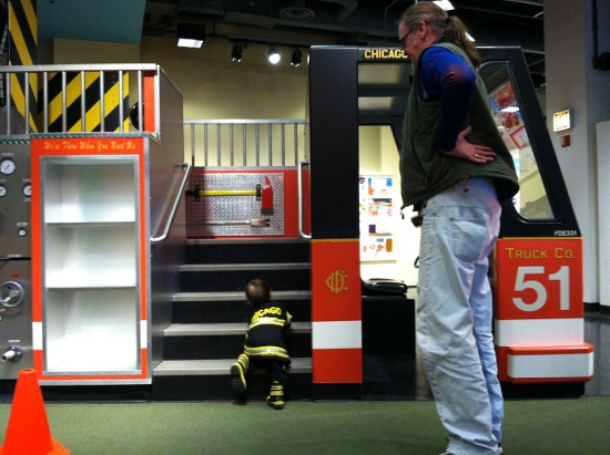 Fire truck stairs are a little steep for this little fireman
