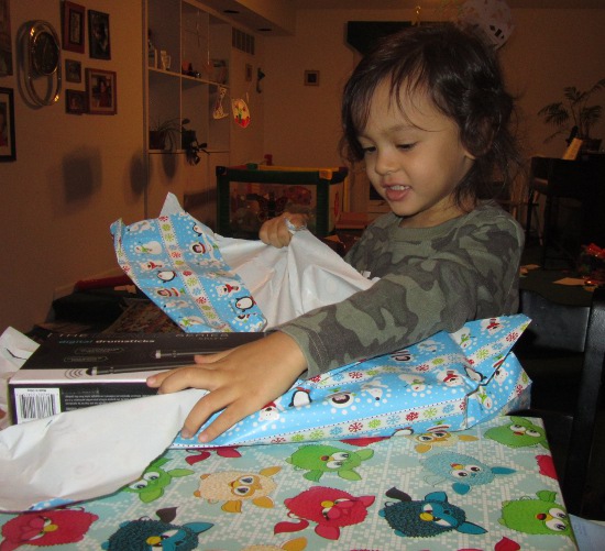 Tearing the wrapping paper