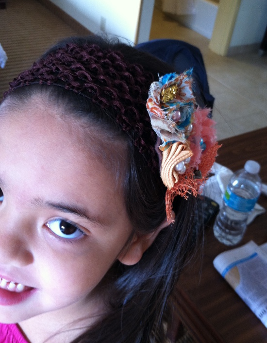The breakfast lady at our hotel in Tampa made this lovely hair ornament for Yaya!
