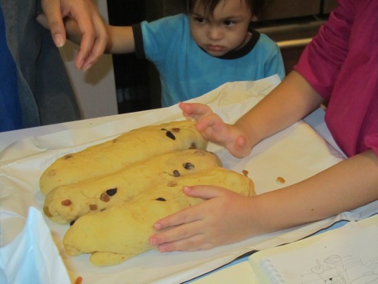 Adik is unhappy he can't keep playing with the dough