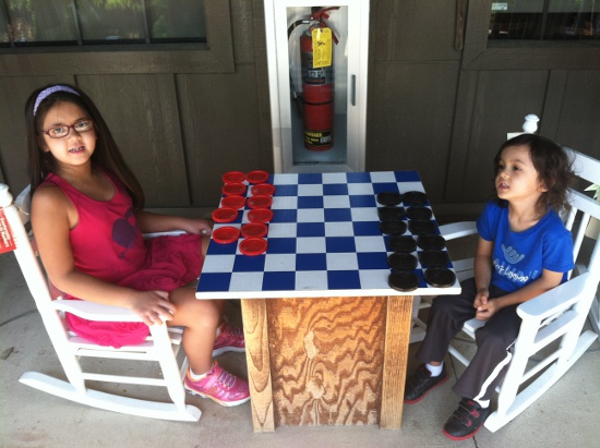 Checkers with Adik at a Cracker Barrel
