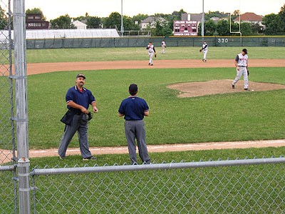 Umps chatting in between innings