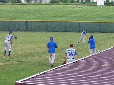Playing Catch to warm up before a game - Vin in far left