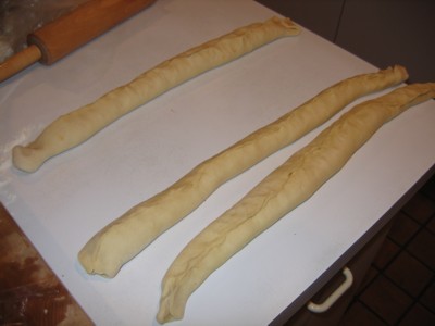 Strips of filled bread dough