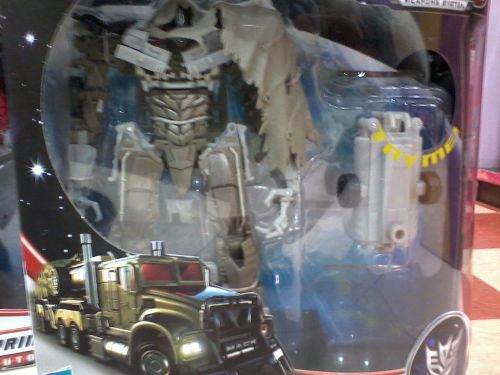 Kiasu robot! Prime transforms into a truck, so he wants to as well...