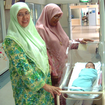 Irfan with two new grandmothers