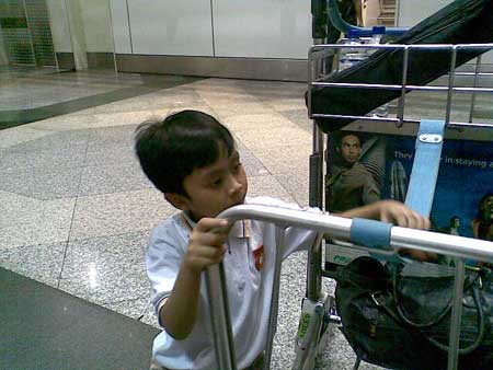 Irfan playing with the trolley