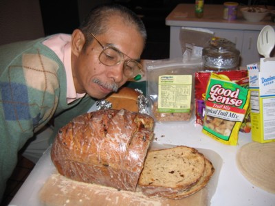 Abah appreciating the bread