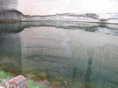 Pool reflecting the rock