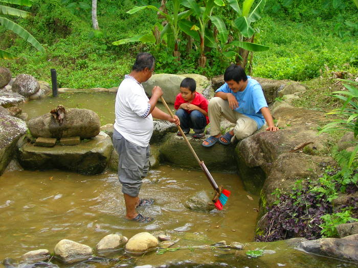 Irfan picks up pointers on cleaning the artificial creek