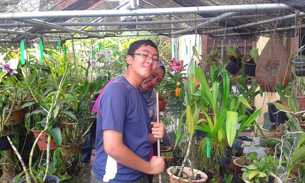 Irfan with orchids