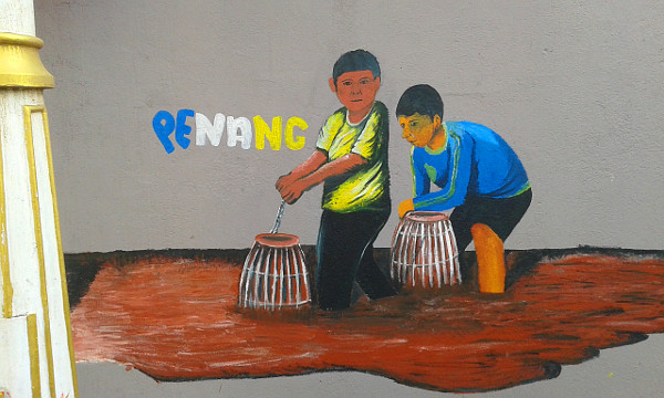 The Penang artwork is of two boys bubu-fishing