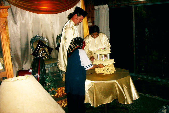 With the wedding cake