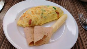 Omelette with onions, bell peppers and mushroom, with some other stuff