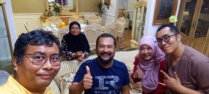 Awi's family at his living room